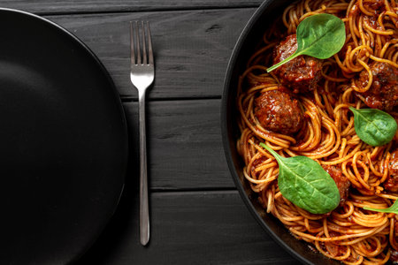 Classic Italian spaghetti with meat and basilの写真素材