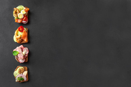 Danish sandwiches from above. Blank space for text. Mock up. Plate with sandwiches and snacks on a...