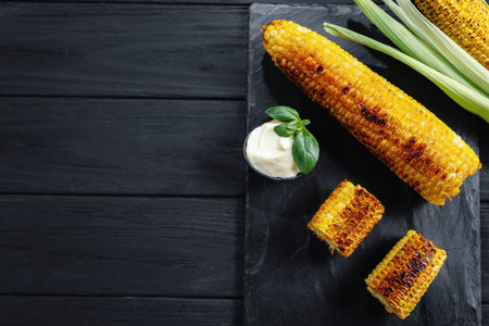 charcoal corn. Summer Food. Roasted corn. top view and copy space.