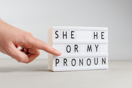 He or she, or they, choice of gender concept. The LGBT flag. Transgender vibe, the right to choose genderの写真素材