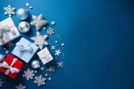 Christmas background with gift boxes and snowflakes. Top view with copy spaceの素材