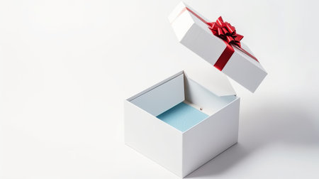 White gift box with red bow isolated on white background. 3d renderingの素材