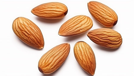 Almond nuts isolated on a white background. Close-up.の素材