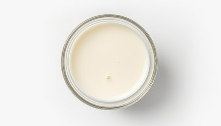 Aroma candle in a glass jar on a white background, top viewの素材