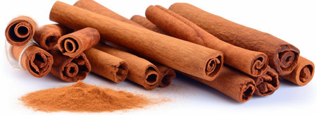Cinnamon sticks and powder isolated on white background. Close up.の素材