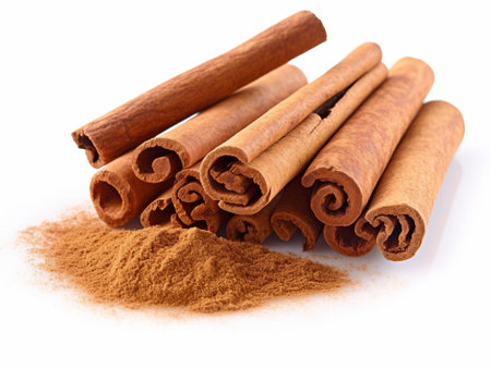 Cinnamon sticks and powder isolated on white background. Close up.の素材
