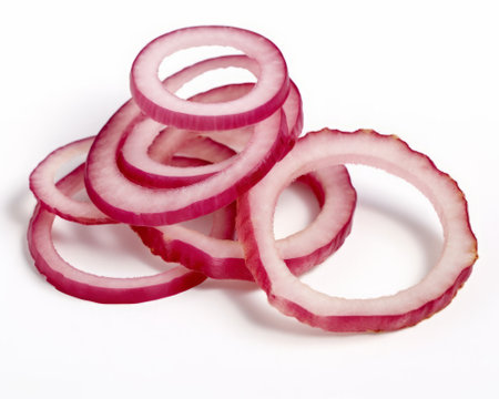 Sliced red onion rings isolated on white background cutout.の素材