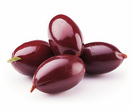 Black olives isolated on white background close up. Ripe olivesの素材