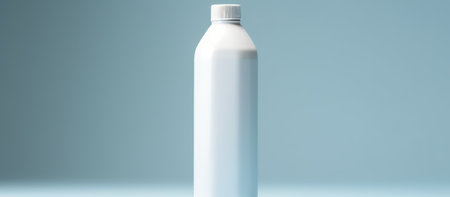 White plastic bottle mockup on blue background. 3D rendering.の素材