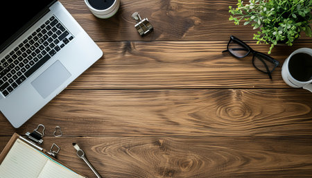 Office desk table with laptop, supplies and coffee cup. Top view with copy spaceの素材