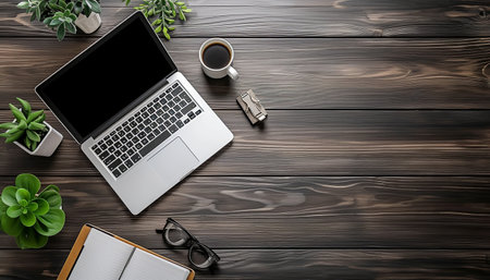 Top view of modern workplace with laptop, notebook and coffee cup. Mock upの素材