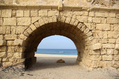 Ancient Roman aqueduct at Ceasarea along the coast of the Mediterranean Sea, Israelの写真素材