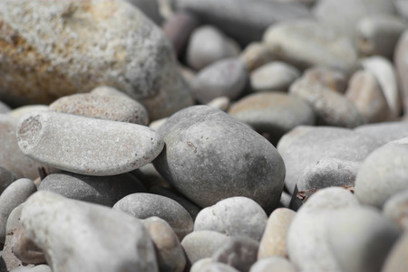 Smooth beach stone background, textureの写真素材