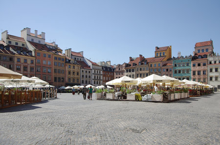 WARSAW, POLAND - APRIL 30: One of squares at Warsaw on April 30, 2012 POLAND. Beautiful buildings of Old Town of Warsaw, attracting thousands touristsのeditorial素材