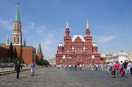 MOSCOW - JULY 02: Tourists walking on Red square on July 02, 2013, Moscow, Russia. Red Square is...
