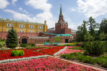 MOSCOW - JULY 02: Moscow Kremlin on July 02, 2013, Moscow, Russia. Colourful flower beds of the first public park in Moscow (near the Moscow Kremlin) make it a favourite spot for the touristsのeditorial素材