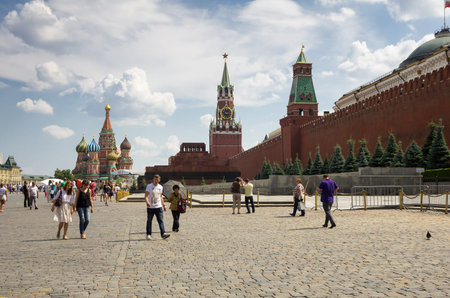 MOSCOW - JULY 02: Tourists walking on Red square on July 02, 2013, Moscow, Russia. Red Square is...
