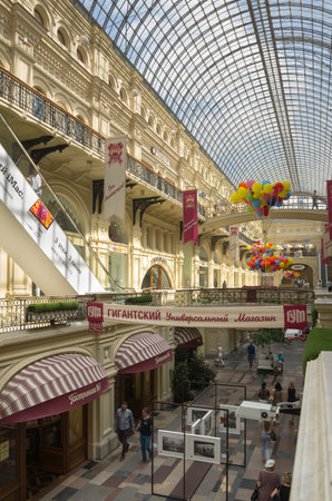 MOSCOW - JULY 02: Shopping gallery of luxury brands in GUM shopping centre on July 02, 2013, MOSCOW, RUSSIA. GUM is the oldest and most famous shopping centre in Moscowのeditorial素材