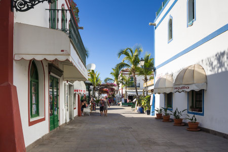 PUERTO DE MOGAN, GRAN CANARIA, CANARY ISLANDS - JANUARY 04, 2014: Pedestrian alley in the harbor area of Puerto de Mogan, a small fishing port and resort on Gran Canaria Island, Spainのeditorial素材