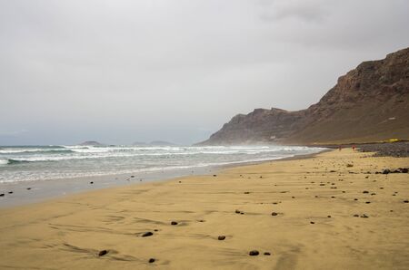 The coast of Atlantic ocean on Lanzarote island, Canary islands, Spainの写真素材