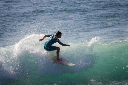 GRAN CANARIA, CANARY ISLANDS - JANUARY 05, 2014: Unidentified man surfing on a large wave on Playa...