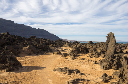 The coast of Atlantic ocean near town Orzola on Lanzarote, Canary islands, Spainの写真素材
