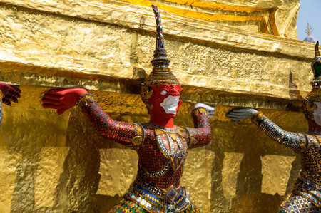 Demon guardian in Wat Phra Kaeo, Bangkok. Wat Phra Kaew is one of the most popular tourists destination in Thailandのeditorial素材