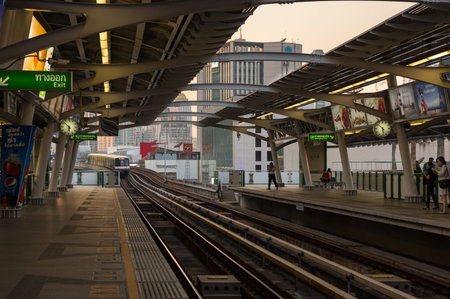 BANGKOK, THAILAND - FEBRUARY 05, 2015: BTS train arriving at station. BTS or the Skytrain is an...