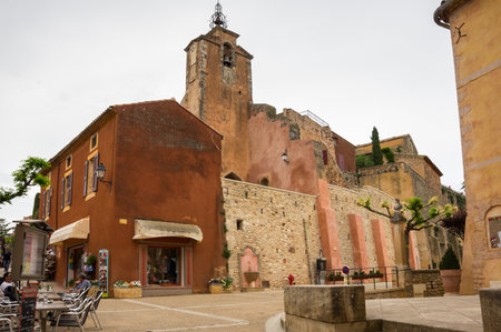 ROUSSILLON, FRANCE - MAY 03, 2015: Street of medieval village of Roussillon. It ochre village is included in list of "The most beautiful villages of France"のeditorial素材