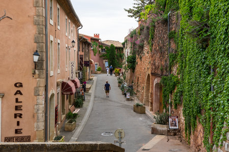 ROUSSILLON, FRANCE - MAY 03, 2015: Street of medieval village of Roussillon. It ochre village is included in list of "The most beautiful villages of France"のeditorial素材