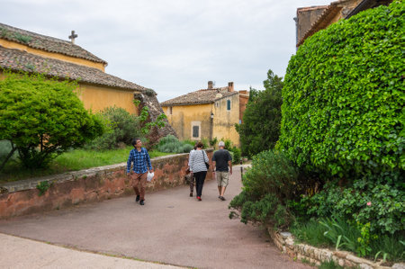 ROUSSILLON, FRANCE - MAY 03, 2015: Street of medieval village of Roussillon. It ochre village is included in list of "The most beautiful villages of France"のeditorial素材