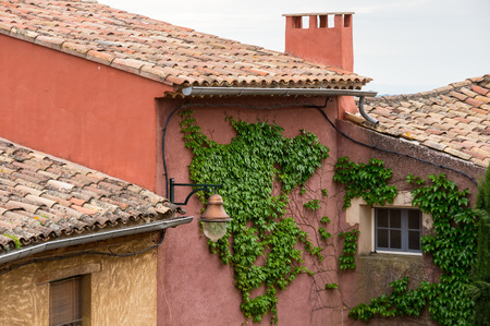 House of medieval village of Roussillon. It ochre village is included in list of "The most beautiful villages of France"の写真素材