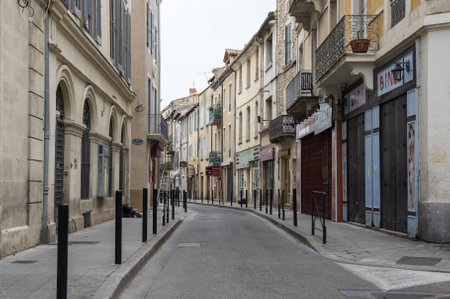 NIMES, FRANCE - MAY 04, 2015: Street scene in historical centre of Nimes. Nimes is a famous and very popular among tourists city in Provence in south of Franceのeditorial素材