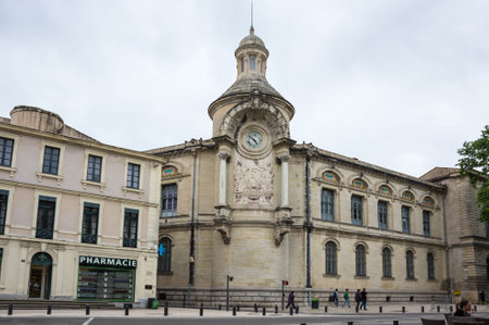 NIMES, FRANCE - MAY 04, 2015: Street scene in historical centre of Nimes. Nimes is a famous and very popular among tourists city in Provence in south of Franceのeditorial素材