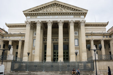 NIMES, FRANCE - MAY 04, 2015: Palace of Justice in Nimes. Nimes is a famous and very popular among tourists city in Provence in south of Franceのeditorial素材