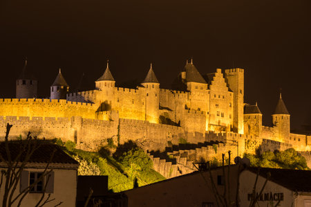 Medieval castle and city of Carcassonne at night, Languedoc-Roussillon, Franceのeditorial素材