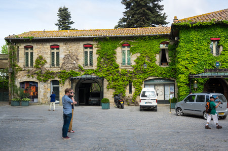 CARCASSONNE, FRANCE - MAY 05, 2015: Street with medieval houses in old town of Carcassonne, Languedoc-Roussillon, Franceのeditorial素材