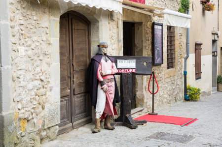 CARCASSONNE, FRANCE - MAY 05, 2015: Street with medieval houses in old town of Carcassonne, Languedoc-Roussillon, Franceのeditorial素材