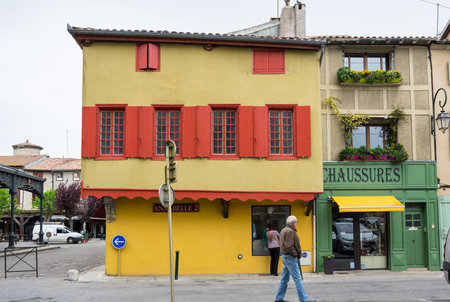 MIREPOIX, FRANCE -  MAY 05, 2015: Old framework houses at main square of medieval village Mirepoix in southern Franceのeditorial素材