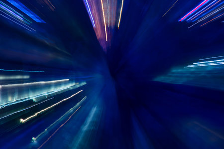 Abstract pattern of city lights from cars, windows, streetlights and bars