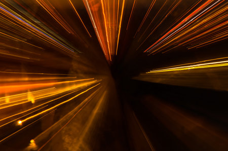 Abstract pattern of city lights from cars, windows, streetlights and bars