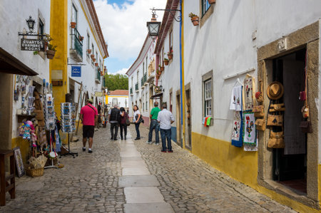 OBIDOS, PORTUGAL - OCTOBER 15, 2015: The street of Obidos in Portugal, popular tourist destination because of its a well-preserved medieval architectureのeditorial素材