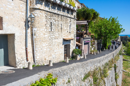SAINT-PAUL-DE-VENCE, FRANCE - APRIL 25, 2016: Street of Saint-Paul-de-Vence, one of the oldest medieval towns on the French Riviera, well known for its modern and contemporary art museums and galleries, Franceのeditorial素材