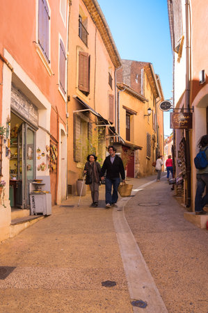 ROUSSILLON, FRANCE - APRIL 27, 2016: Street of medieval village of Roussillon. It ochre village is included in list of "The most beautiful villages of France"のeditorial素材