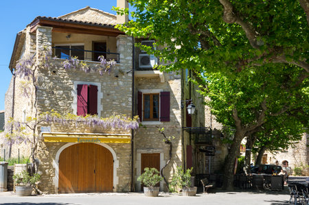 AIGUEZE, FRANCE - APRIL 28, 2016: The street of the village of Aigueze, a small village located south of France in the department of Gard of the french region Languedoc-Roussillon.のeditorial素材