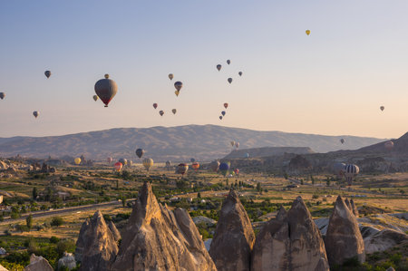 GOREME, TURKEY - JUNE 23, 2015: The great tourist attraction of Cappadocia - balloon flight. Cappadocia is known around the world as one of the best places to fly with hot air balloons. Goreme, Turkeyのeditorial素材