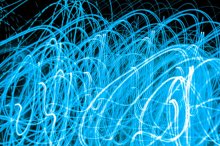 Abstract pattern of city lights from cars, windows, streetlights and bars