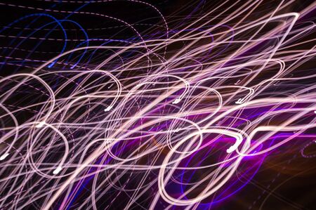 Abstract pattern of city lights from cars, windows, streetlights and barsの写真素材