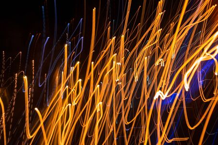 Abstract pattern of city lights from cars, windows, streetlights and barsの写真素材