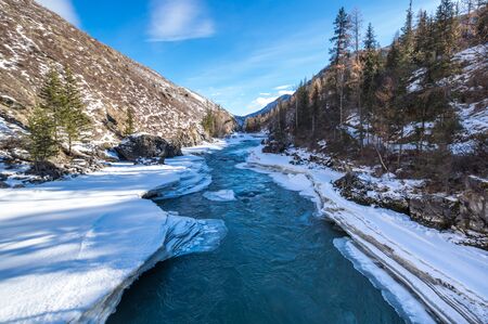 View of river in Altay mountains in the winter, Siberia, Russiaの写真素材